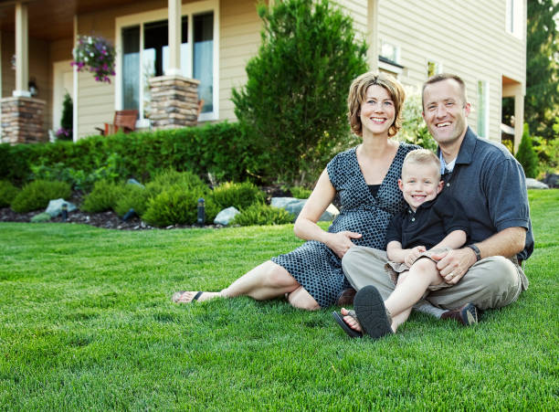 A family smiling together in their community